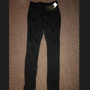 High waisted black ripped jeans